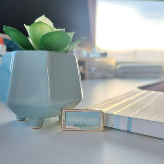 Caratland Enamel Pin